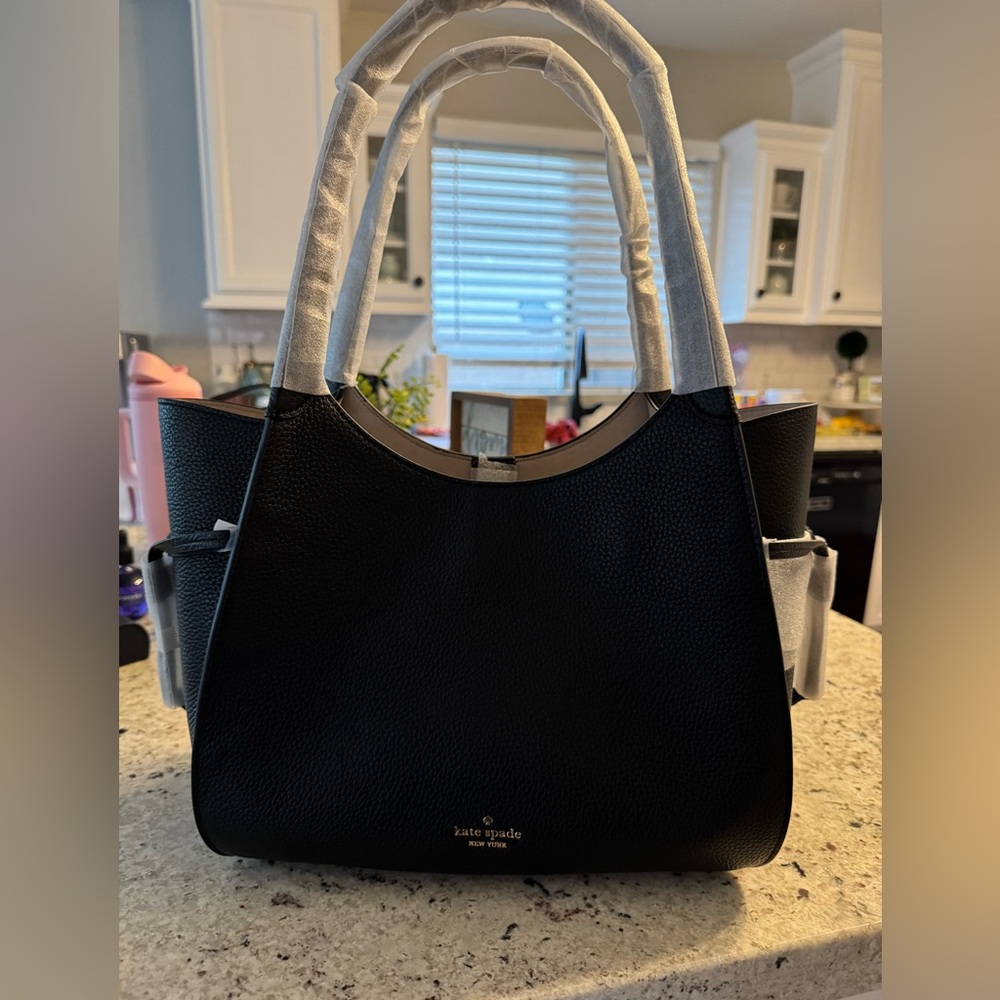 Kate Spade Stash Carryall in Medium black pebbled leather tote